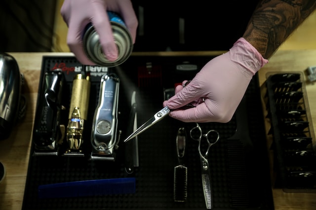 Barber cleaning and sterilizing scissors